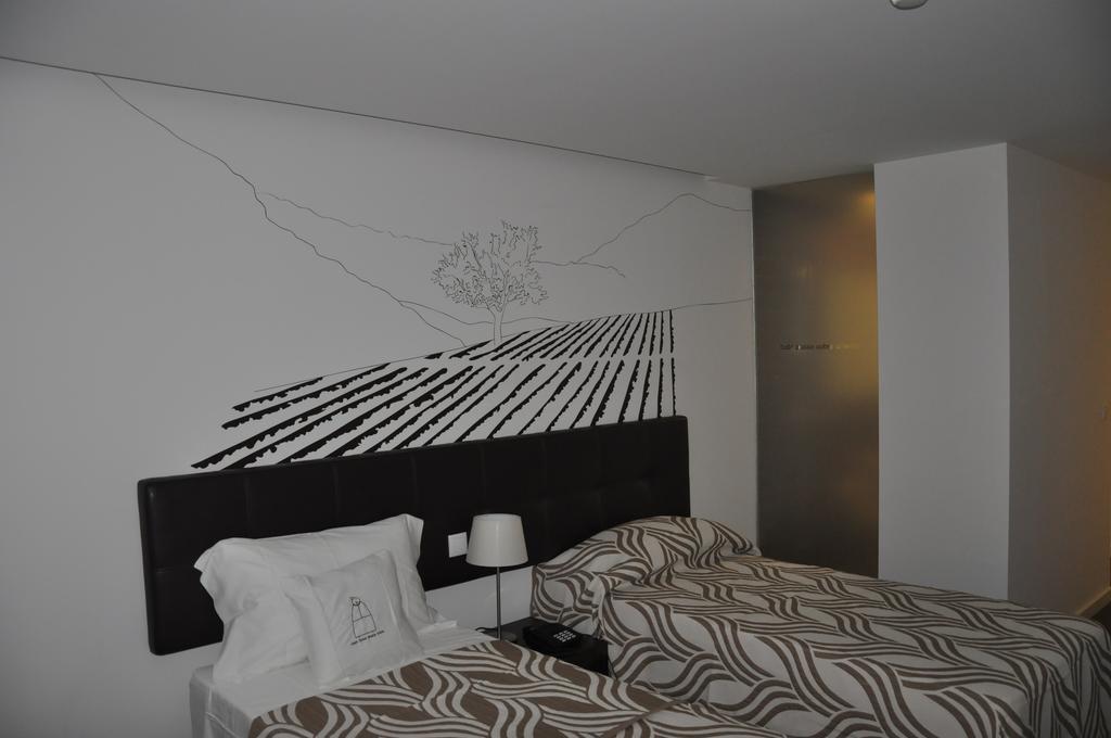 Casa Dona Maria Luiza Guest House Торе де Монкорво Стая снимка